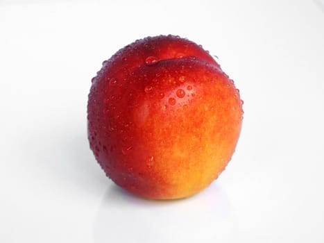 fresh nectarine on white background