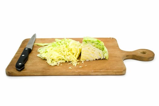 cut fresh cabbage on a black background