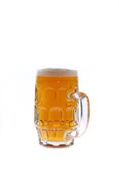 a glass beer mug filled with beer