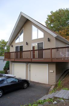 A newer, custom built, a-frame contemporary style house.