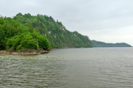 view on the green island on the lake