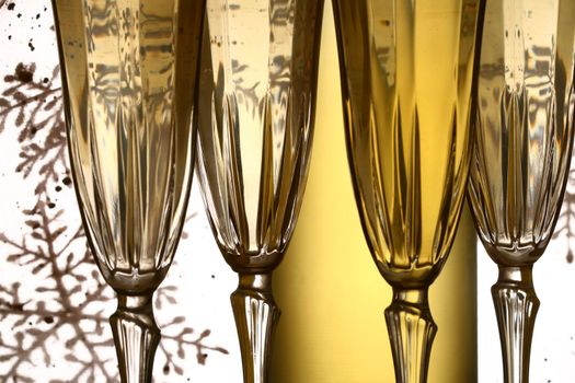 champagne in glasses on white background