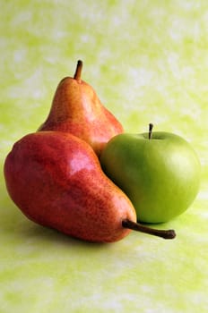 Pears and green apple isolated