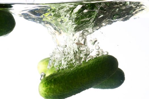 cucumber splash isolated on white background