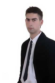 young serious man standing in a white background