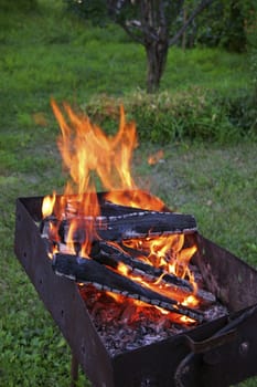 An open wood-fire outdoors