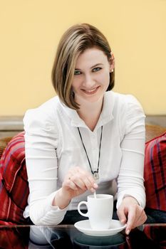 Young woman  drink coffee in break time