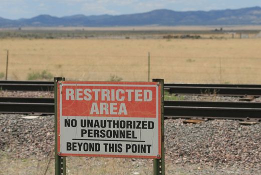 Sign at Very Large Array which warns people not to go beyond a certain point.