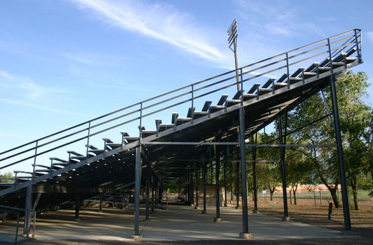 Side view of bleachers at a high school athletic field