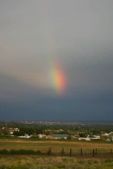 Sun dodger in the evening sky has all the colors of the rainbow