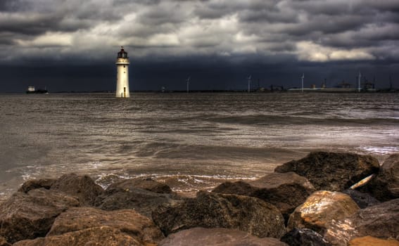 Lighthouse against a stormy sky HDR