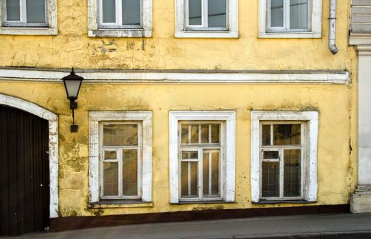 Old wall of house with a  in Europe