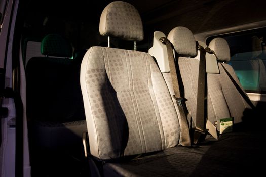 seats inside of a car, beautiful colors and light