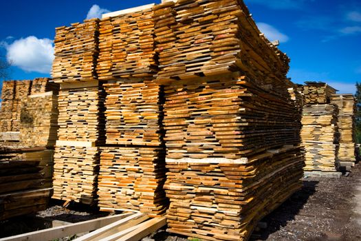 lumber collection on blue sky as background