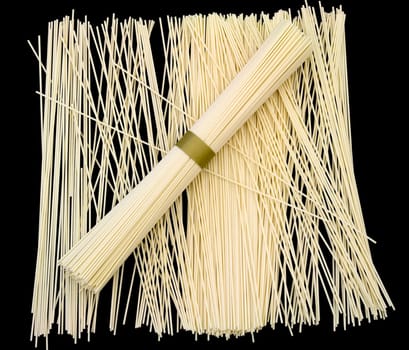 Japanese white wheat noodles on a black background