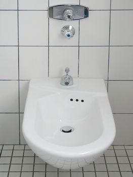 white china bidet in a modern bathroom