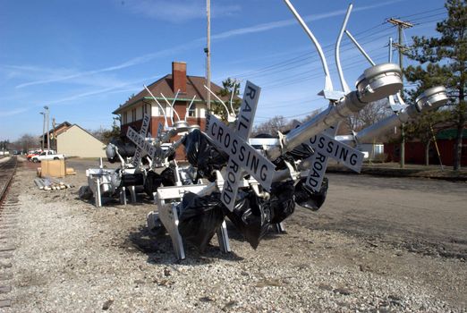 Railroad crossing signs that are yet to be installed.