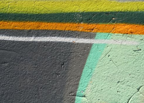 Very abstract detail of an illegal graffiti. Urban background texture.