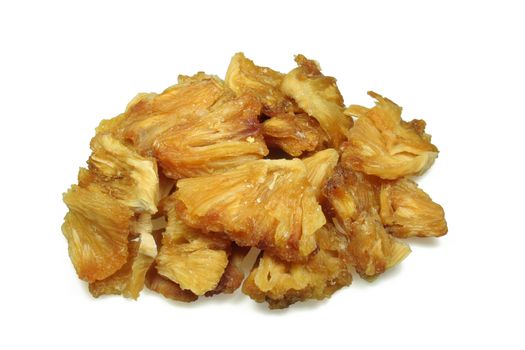 Dried pieces of pineapple on white, healthy alternative to industrial candies. Clipping path included.