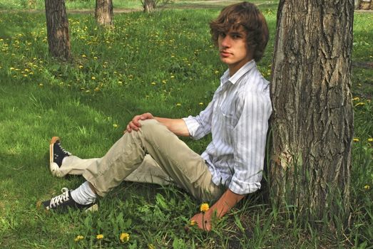 the young man near the tree