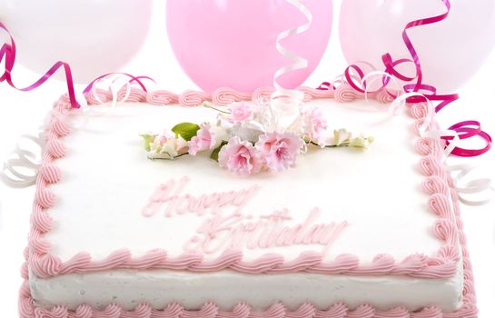 Delicious beautifully decorated bithday cake and balloons