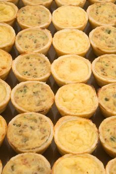 Smoked cheese and herb quiches
