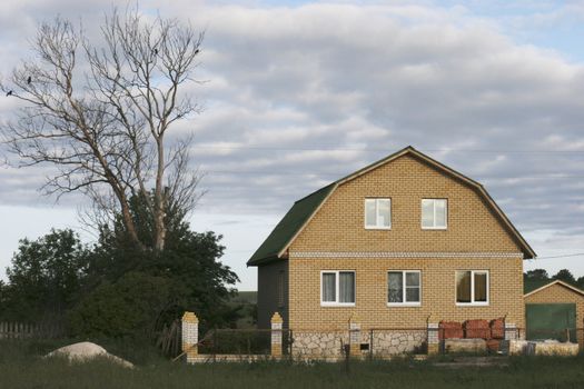 The Matutinal picture. New not yet built house with the building materials. Russia.