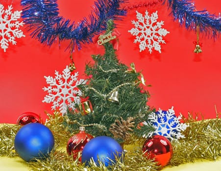 New year's embellishment under artificial fir tree