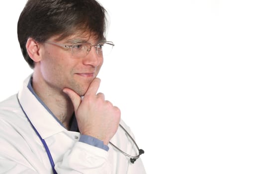 Male doctor with thoughtful expression, hand on chin