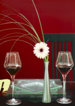 Two tablewears with flower in the middle