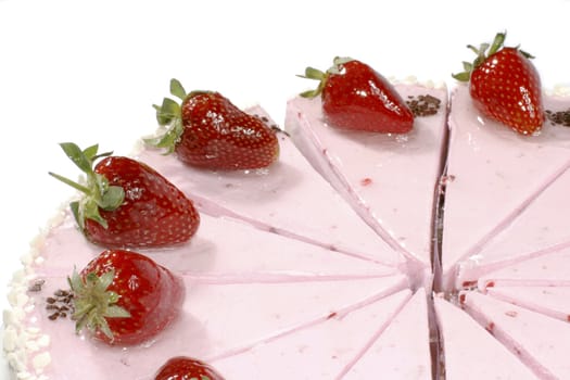 tasty cake with cream and with fresh strawberries