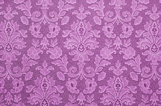 Floral vintage wallpaper background. Old Yellowed orange color.