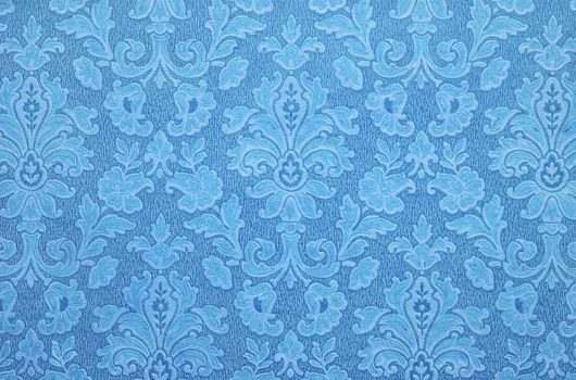 Floral vintage wallpaper background. Old Yellowed orange color.
