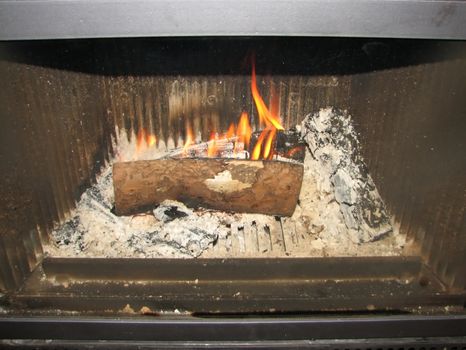 small fire starting to burn in a fireplace