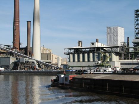 oil refinery with a small petrol tanker, inland traffic, on the Dortmund-Ems-Kanal near Lingen, Emsland, Germany, 2008