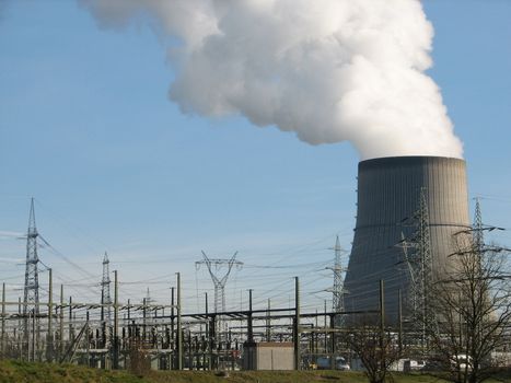 power supply lines with cooling chimney, Emsland, Germany, 2008