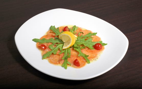 italian dish: carpaccio with salmon and lemon