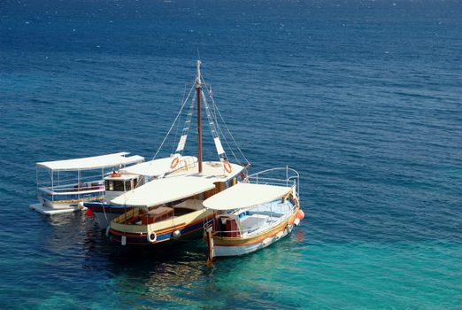 tourist taxi boats on mediterranean sea - beach zlatni rat, Croatia