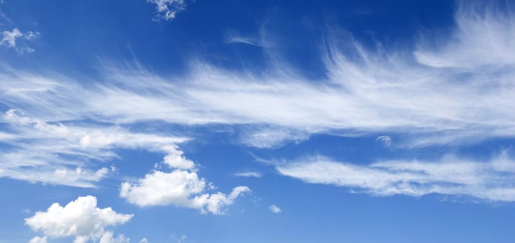 Panoramic shot of clouds in the wind after a springtime rainstorm