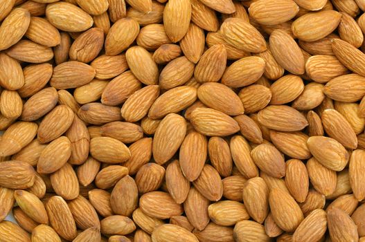 Top view of peeled almonds in natural light