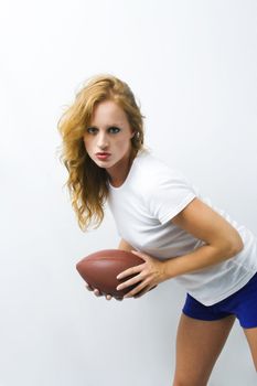 Beautiful model is ready to play some football.