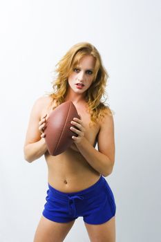 Beautiful model shows her desire for the game of football.