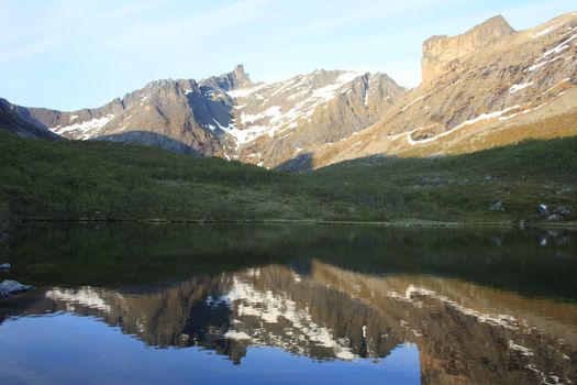 A small freshwater in North Norway.
Water mirror of a mountain.
