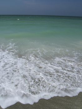 waves breaking on seashore