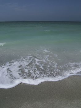 waves breaking on seashore