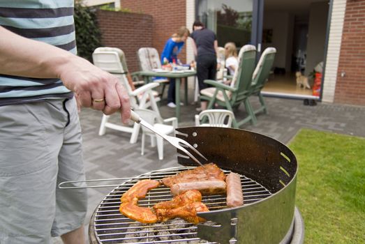 Meat and kebabs on sizzling hot barbecue.