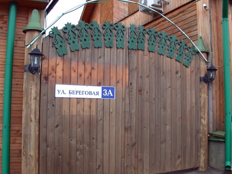 The Artistic forging, wooden gates. Russia, Kostroma. No trademarks