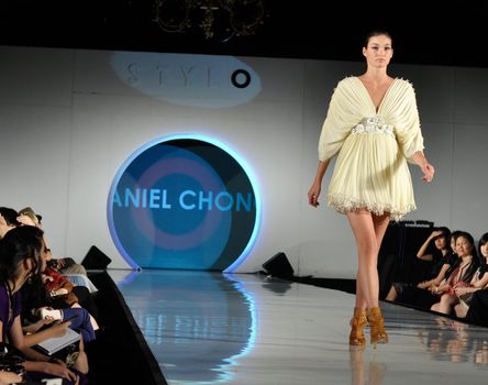 KUALA LUMPUR - APRIL 2 :A model displays creation by Daniel Chong during STYLO Fashion Grand Prix April 2, 2009 in Kuala Lumpur. The fashion show was held in conjunction with Malaysian F1 Grand Prix