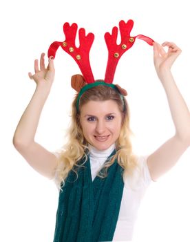girl wearing a reindeer headband  