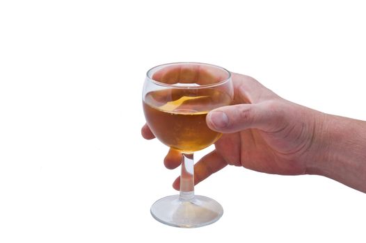 an isolated over white image of a caucasian man's hand holding a glass of liquid possibly white wine, apple juice, cider, etc 
